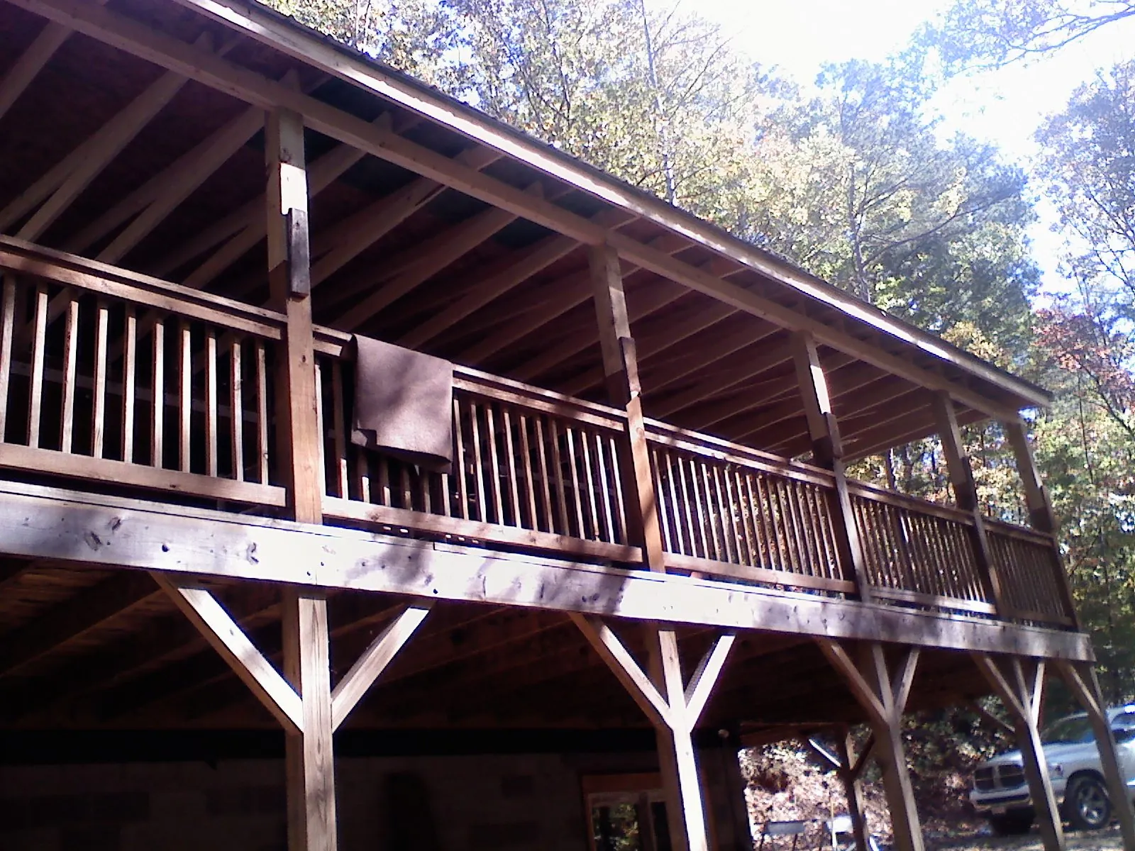 Timber framing under a new elevated porch and deck — Roof Leak Repair in Concord by Roofing Brothers